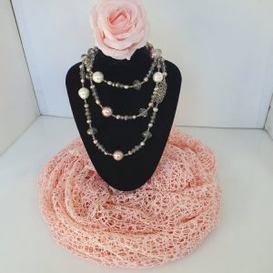 Long single strand necklace with pearl, glass bead and detailed silver clasp